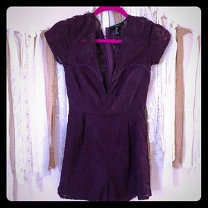 Purple slit neck lace romper with short sleeve